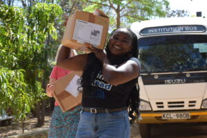 Books being unloaded by Book Aid International partner